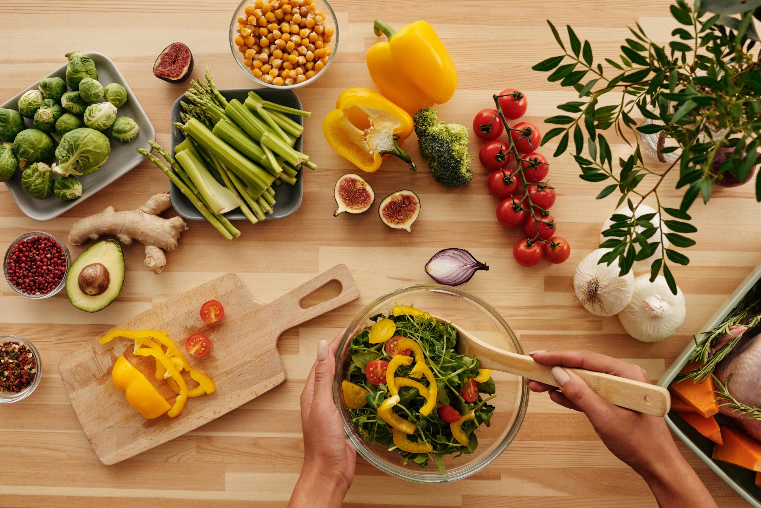 Many fruits on the table along with vegetables